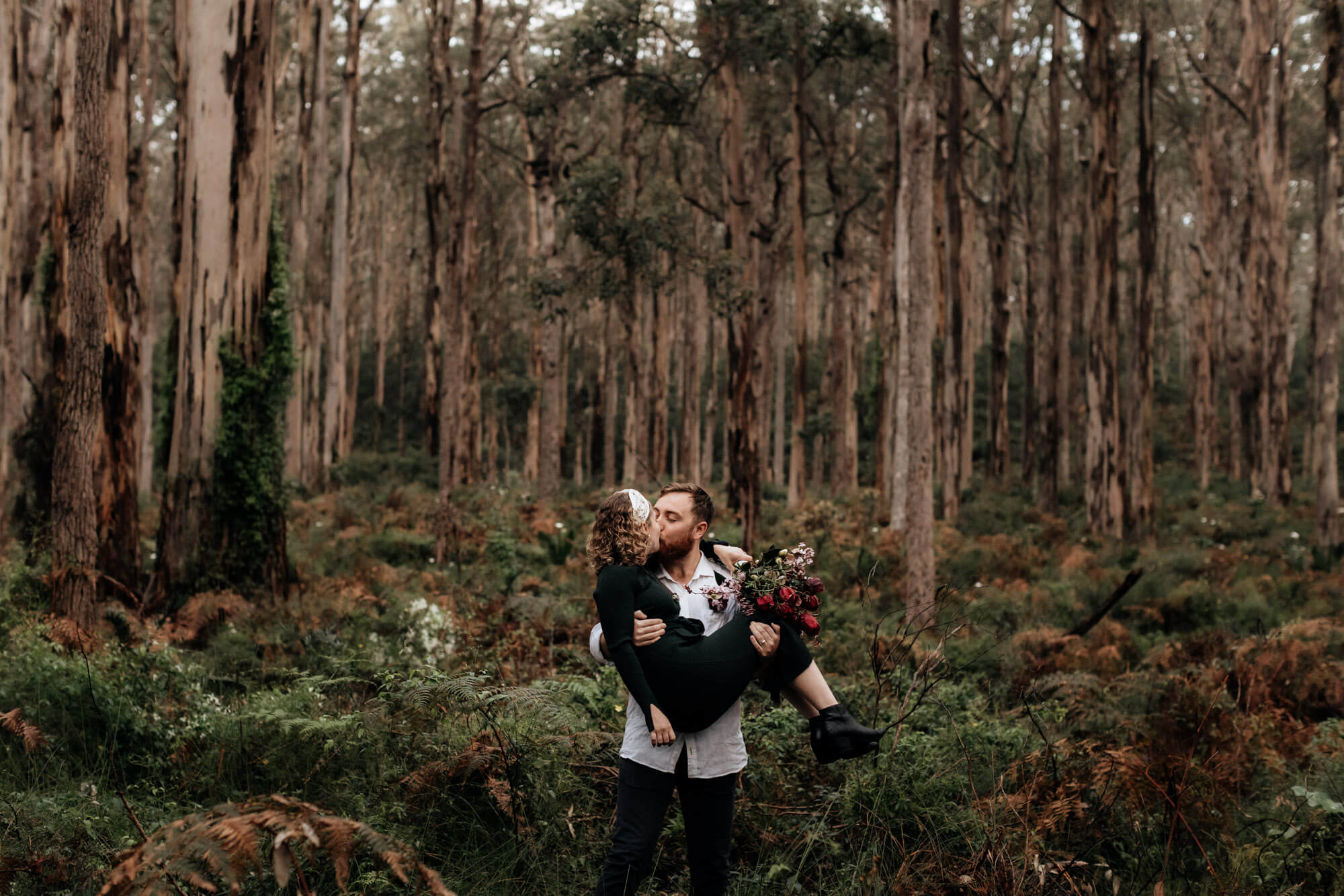 couple embrace dring their Boranup Forest Adventure Elopement