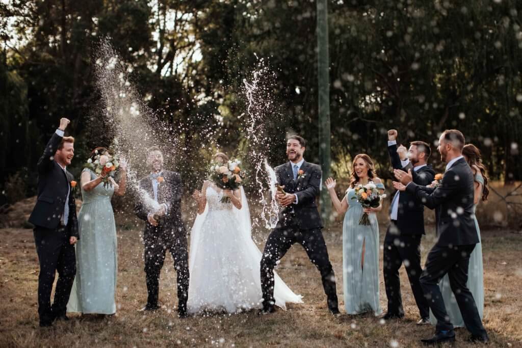 a champagne spray in celebration of the Pemberton Wedding